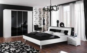 dormitorio blanco y negro con mucha luz natural