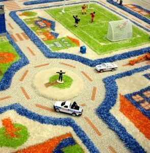 alfombra infantil con diseño de ciudad