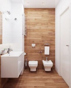 Baño revestido con vinilo simil madera 1